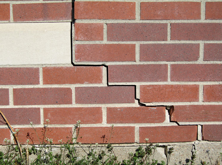 Stair Step Crack in wall at Bollards Court requiring repair to reinstate the structural integrity of the wall